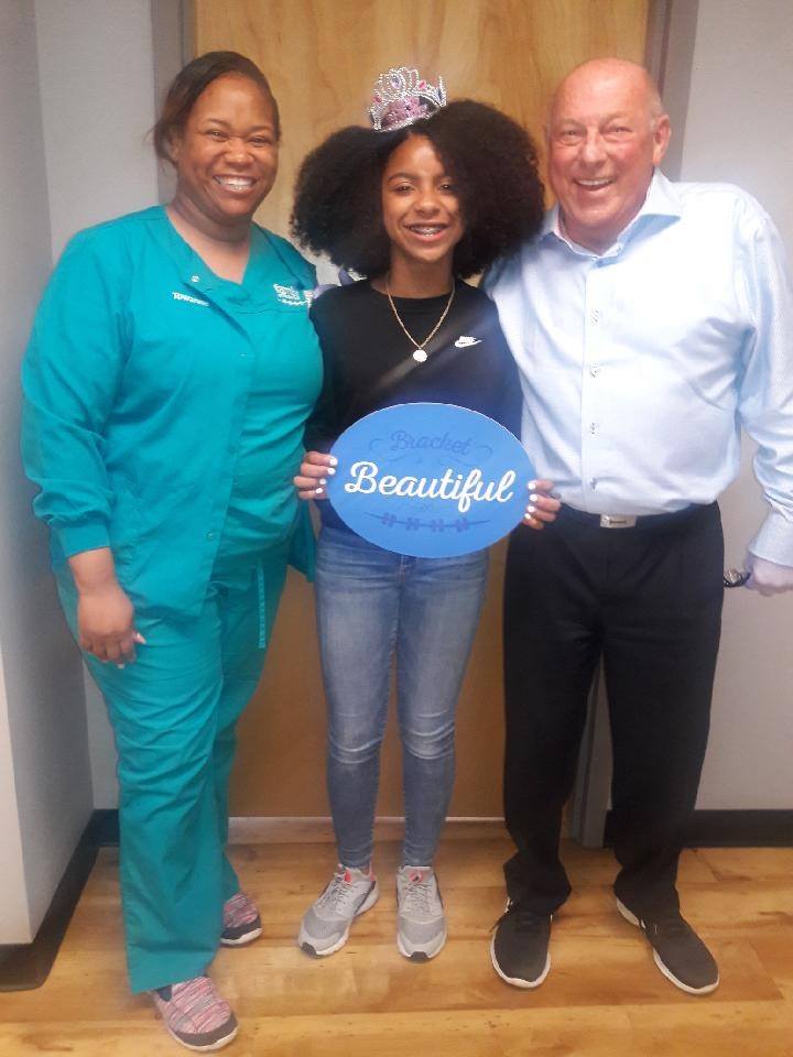 orthodontist and braces patient